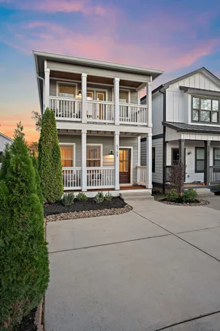 a front view of a house with yard