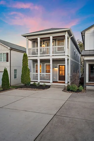 a front view of a house with yard