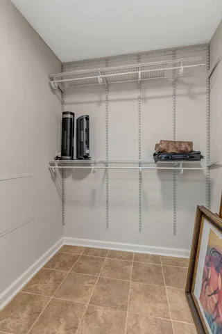 a view of a room with racks on the wall