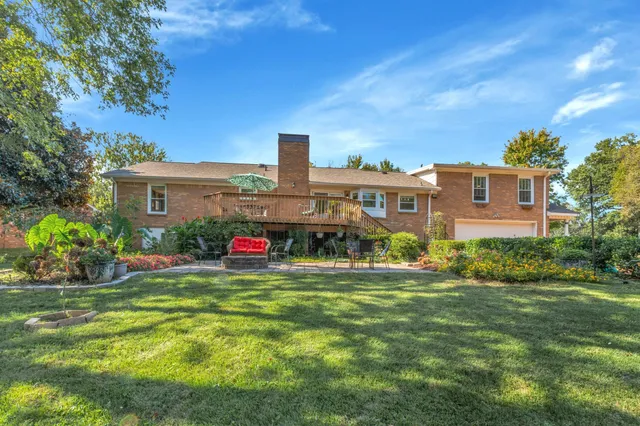 a front view of a building with garden