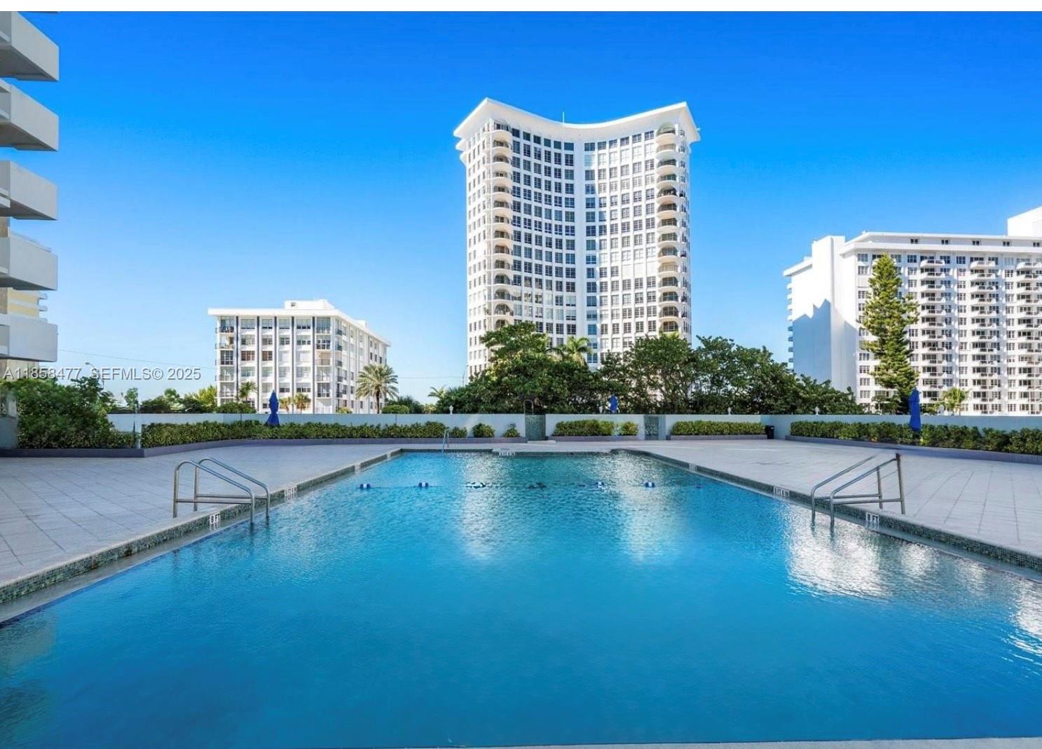 5601 Collins Avenue, Unit 820 Miami Beach, FL 33140 - Photo 17 of 23 a view of a city with tall buildings