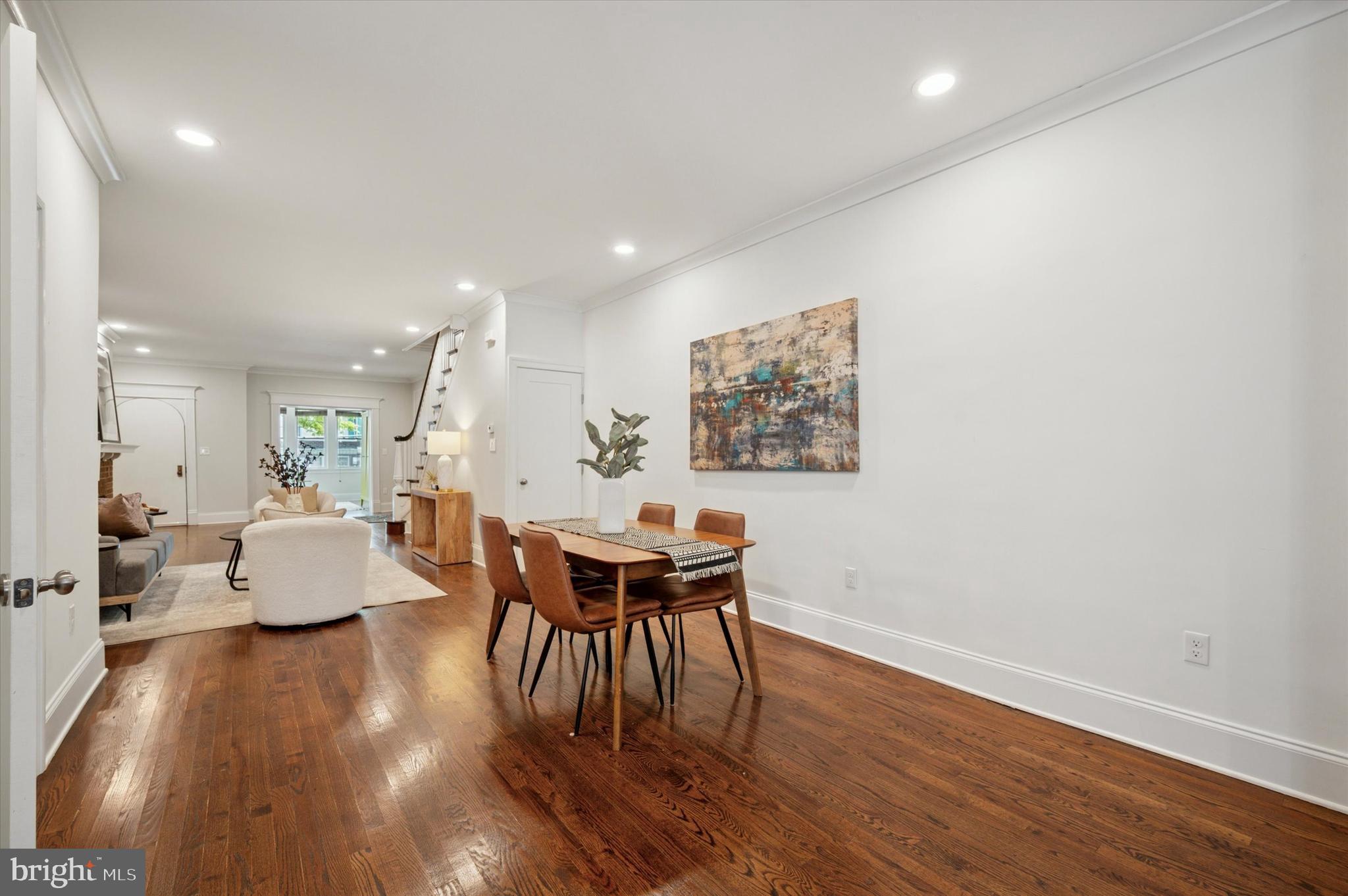 4935 Pine Street Philadelphia, PA 19143 - Photo 11 of 40 a view of a dining room with furniture and wooden floor