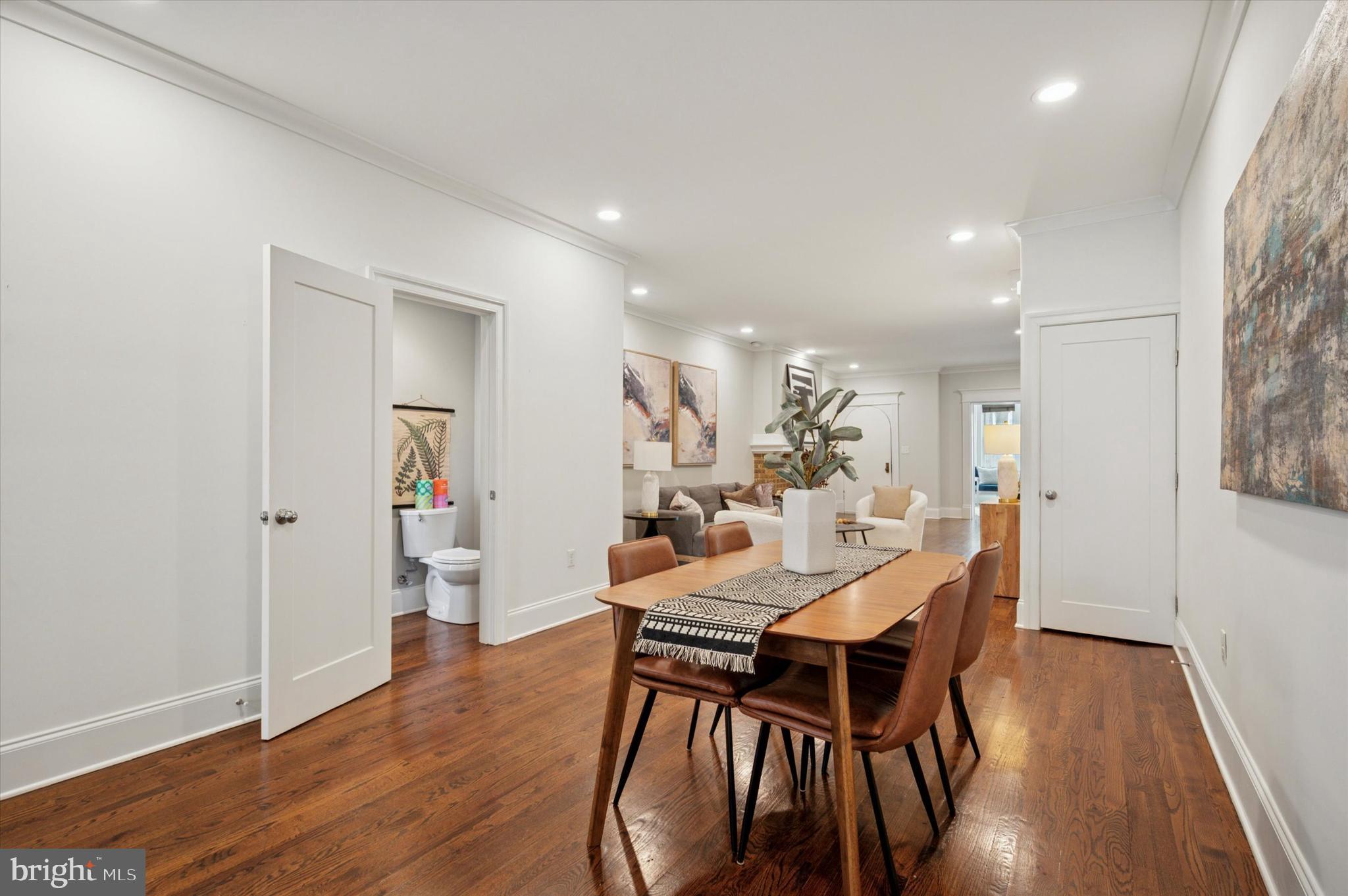 4935 Pine Street Philadelphia, PA 19143 - Photo 12 of 40 a view of a dining room with furniture and wooden floor