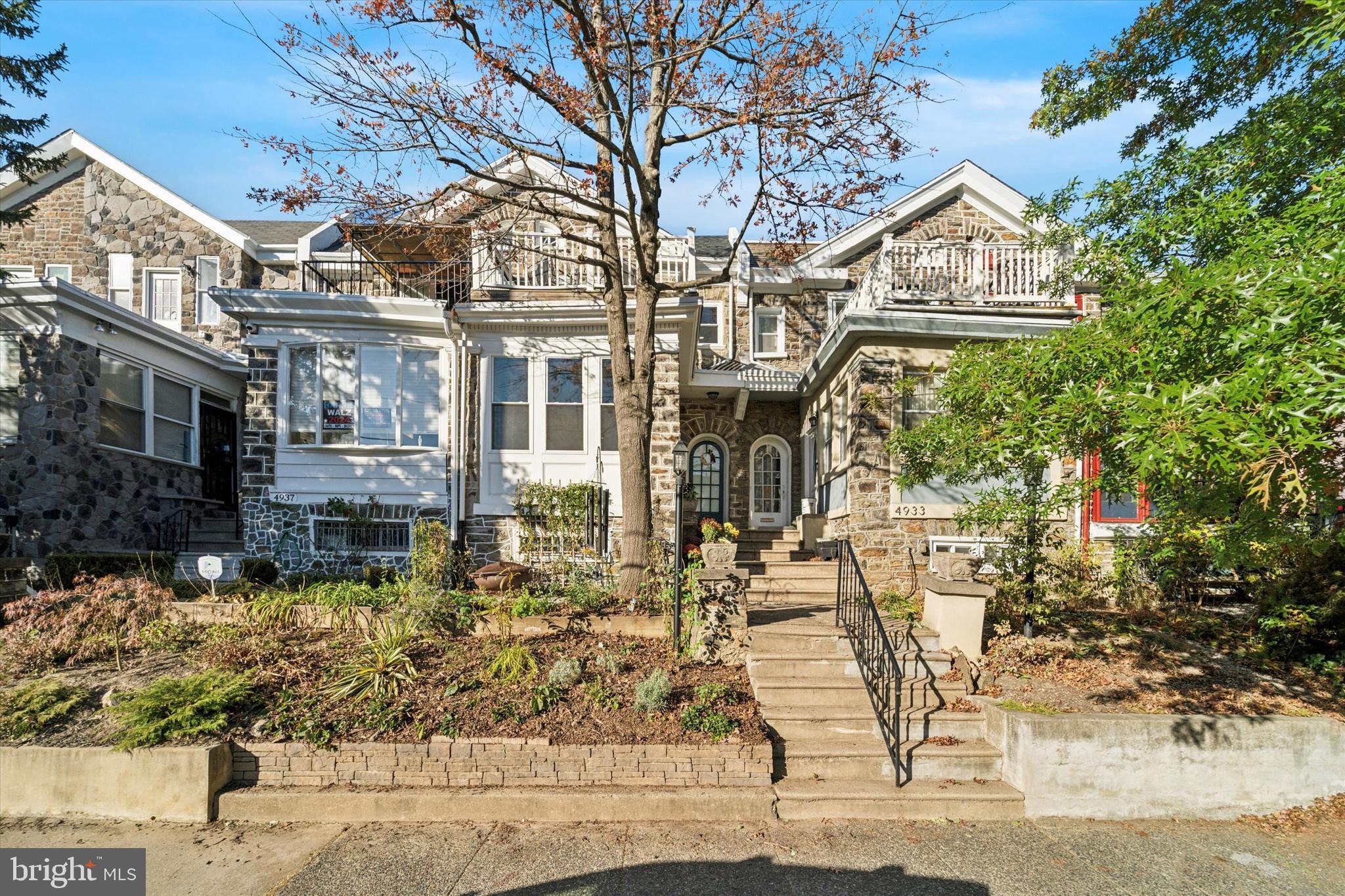 4935 Pine Street Philadelphia, PA 19143 - Photo 2 of 40 front view of a house with a street