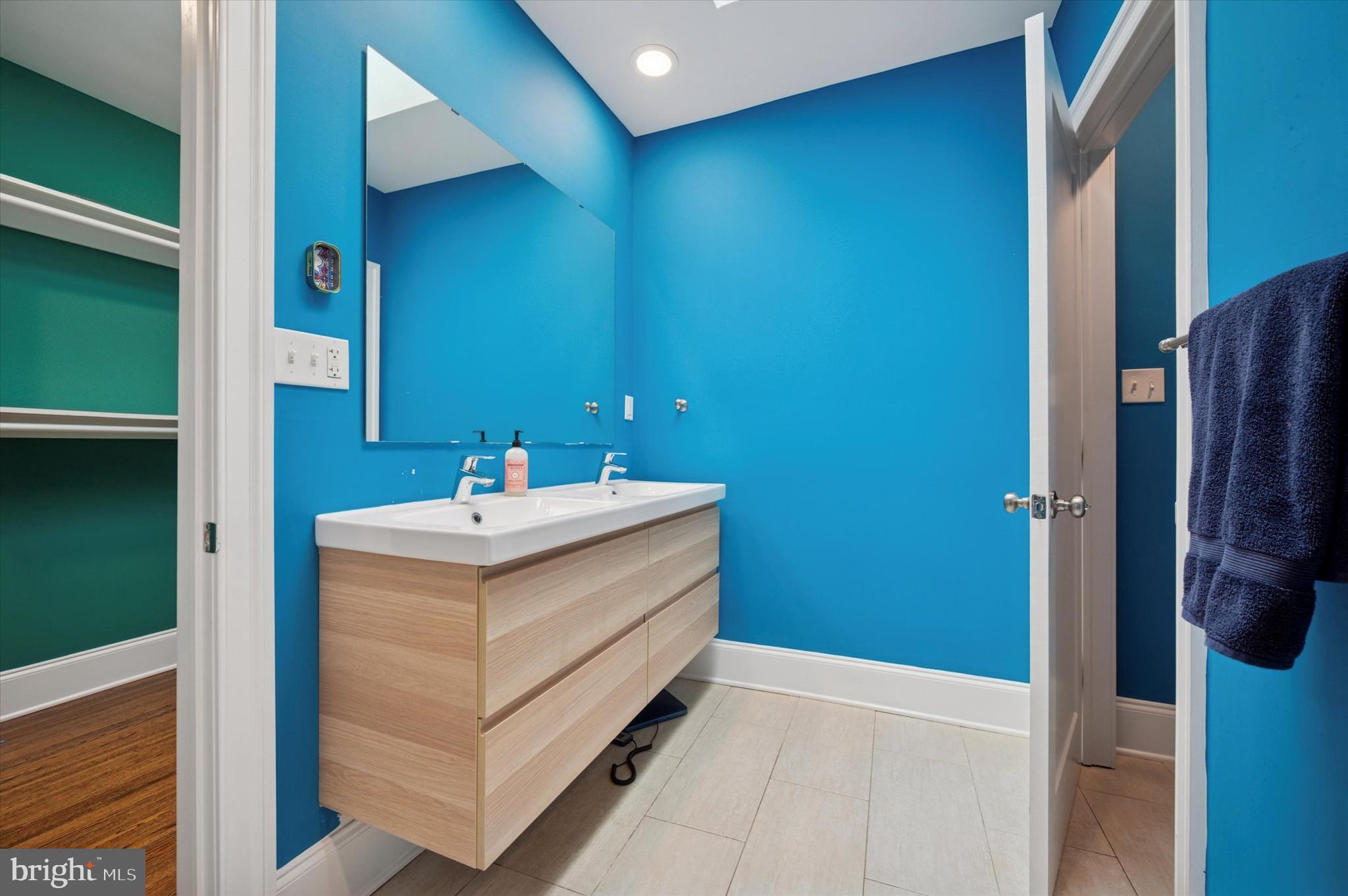 4935 Pine Street Philadelphia, PA 19143 - Photo 26 of 40 a bathroom with a sink and a mirror