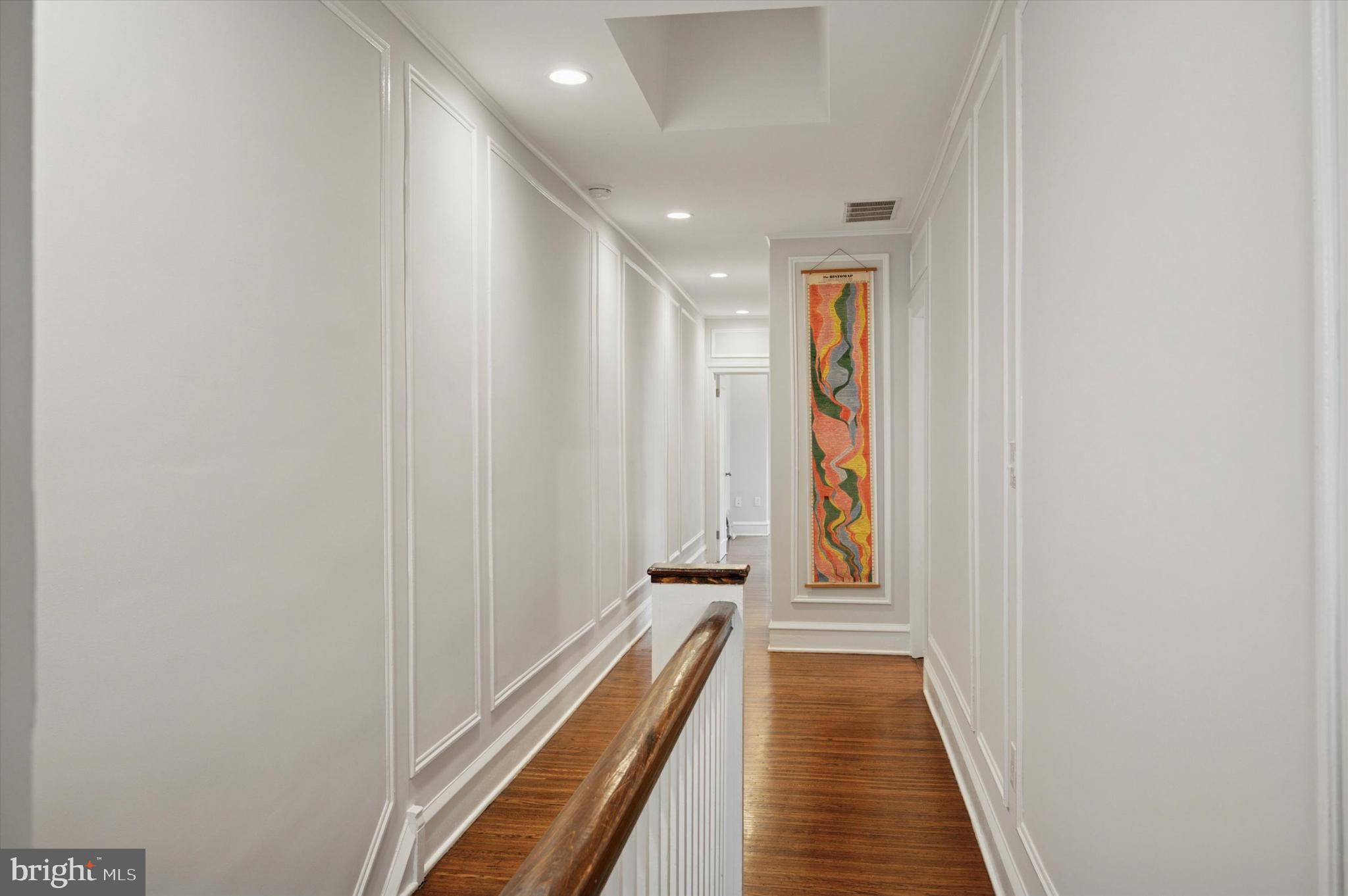 4935 Pine Street Philadelphia, PA 19143 - Photo 27 of 40 a view of a hallway with wooden floor