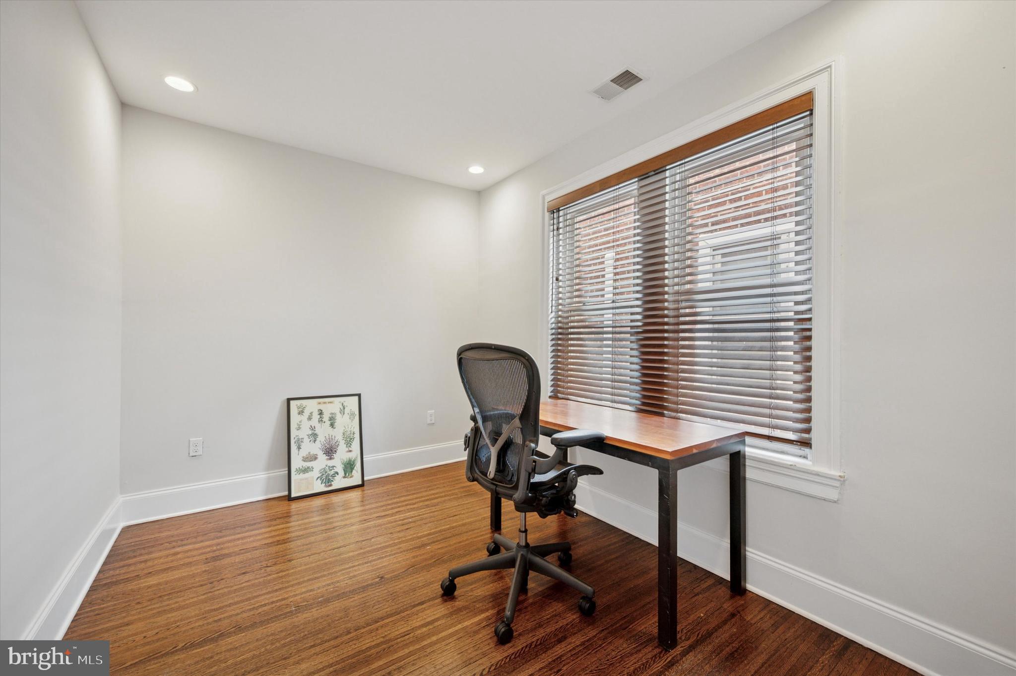 4935 Pine Street Philadelphia, PA 19143 - Photo 29 of 40 a view of a workspace with furniture and a window