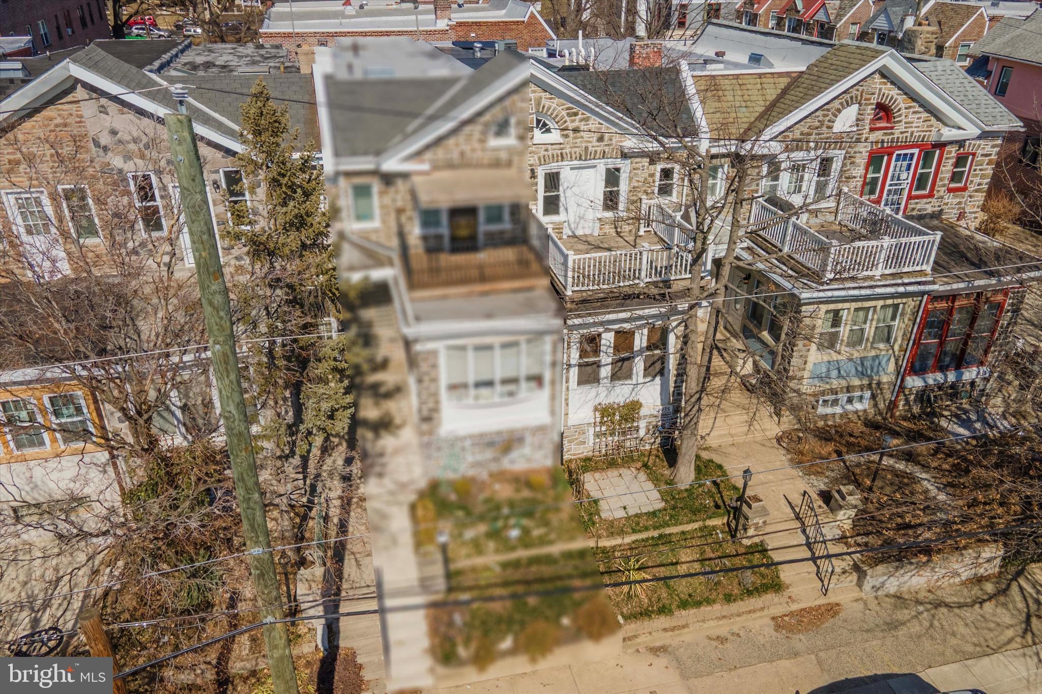 4935 Pine Street Philadelphia, PA 19143 - Photo 38 of 40 a view of a house with a yard