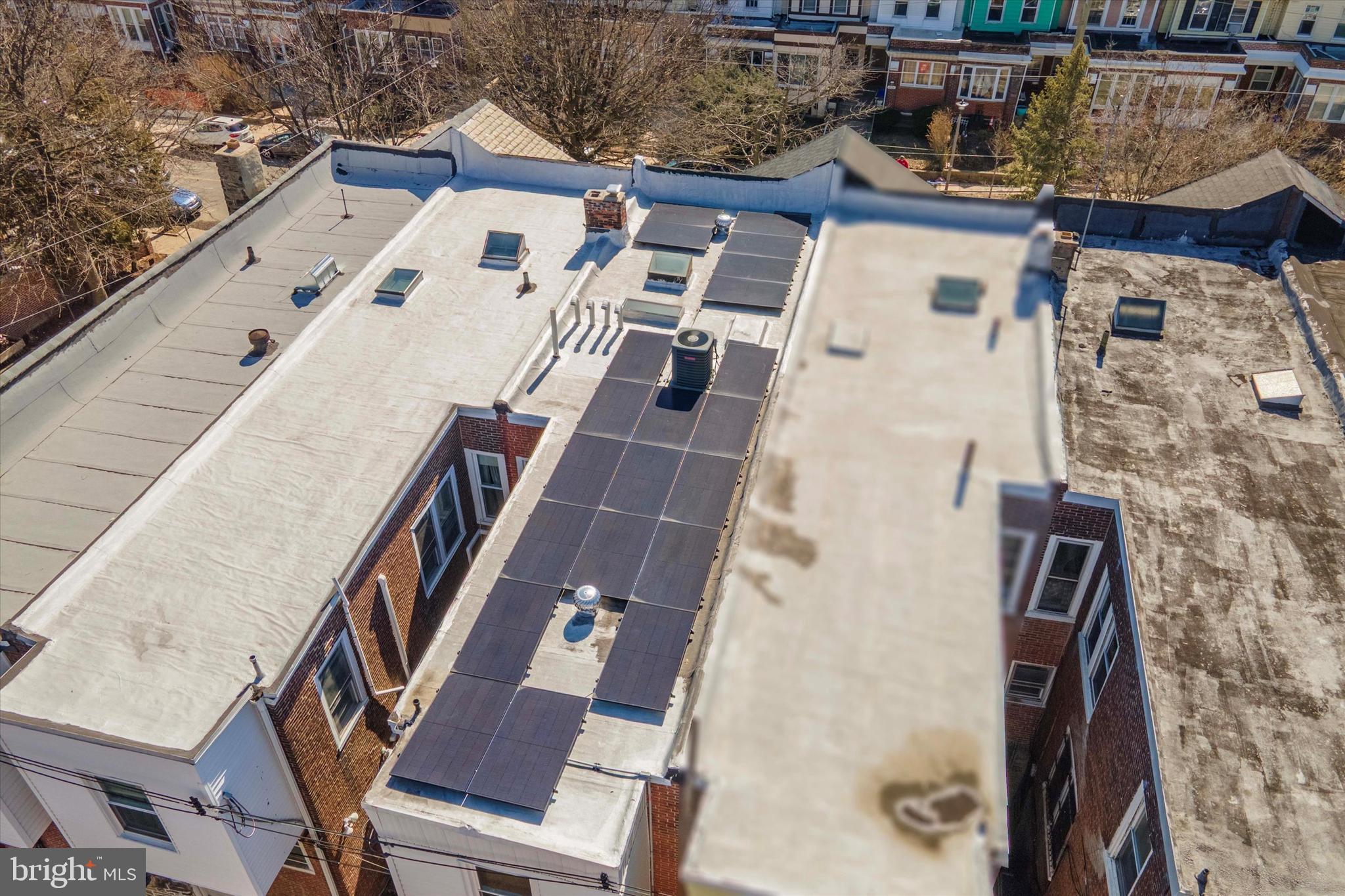 4935 Pine Street Philadelphia, PA 19143 - Photo 39 of 40 a view of roof house with wooden floor