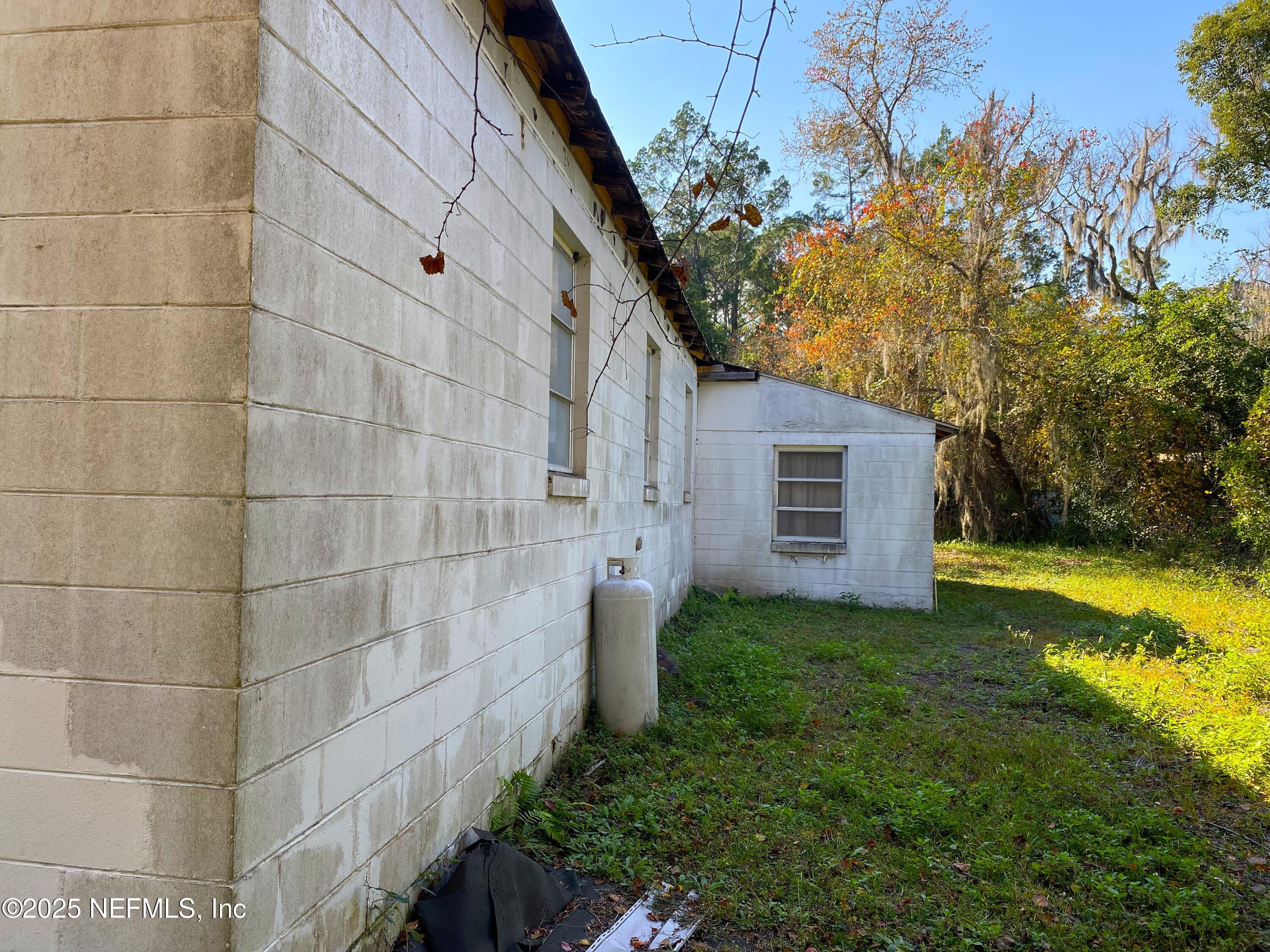 228 Yelvington Road East Palatka, FL 32131 - Photo 18 of 32 a view of a back yard of the house