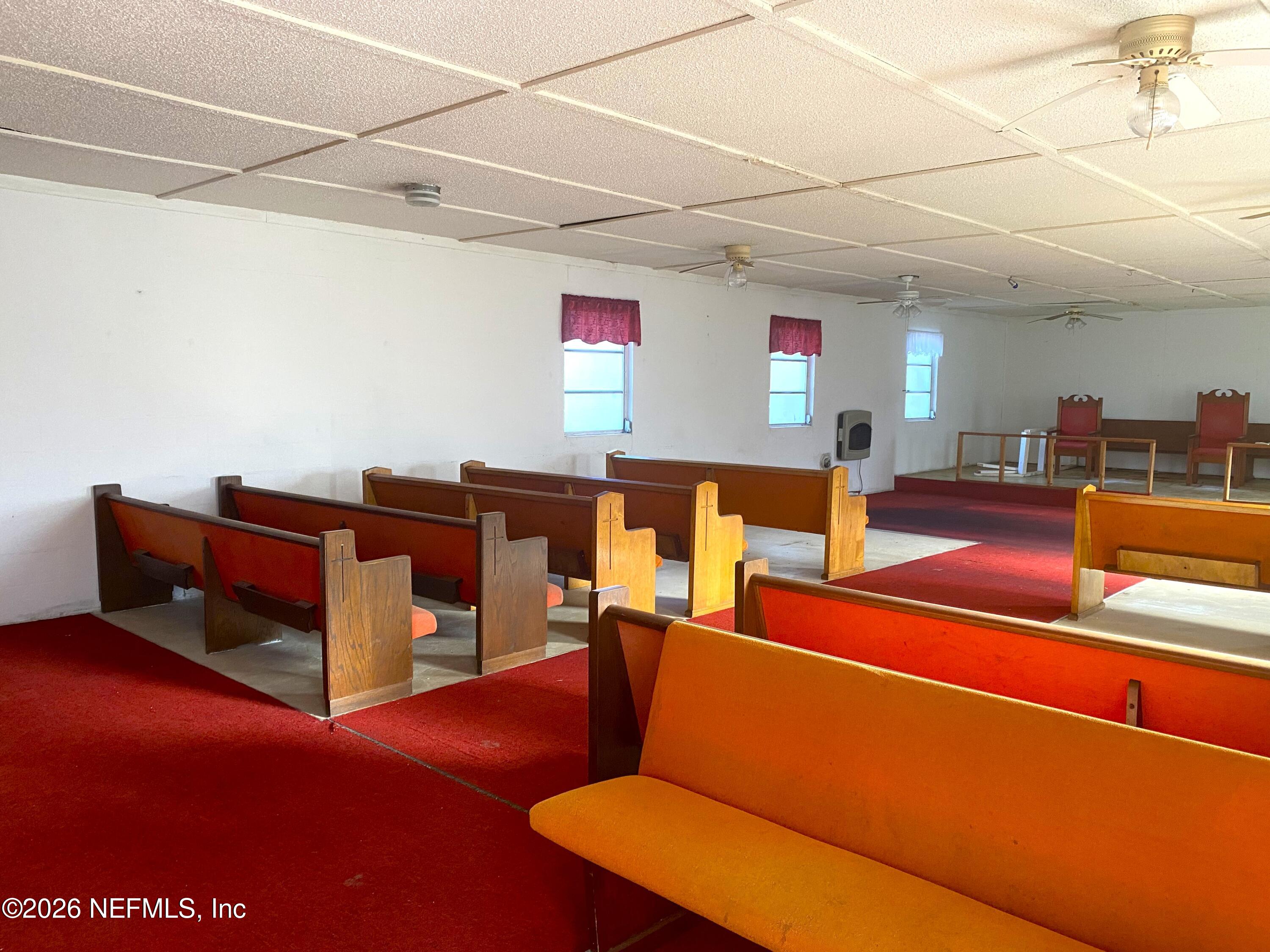 228 Yelvington Road East Palatka, FL 32131 - Photo 2 of 32 a living room with furniture pool table and a projector screen