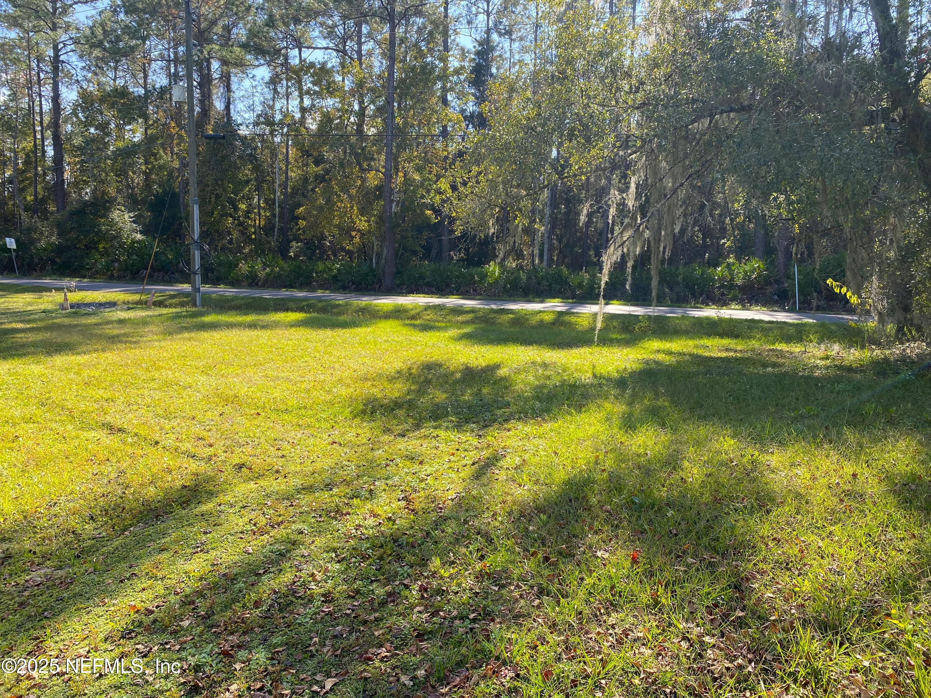 228 Yelvington Road East Palatka, FL 32131 - Photo 27 of 32 a view of a swimming pool with an outdoor space