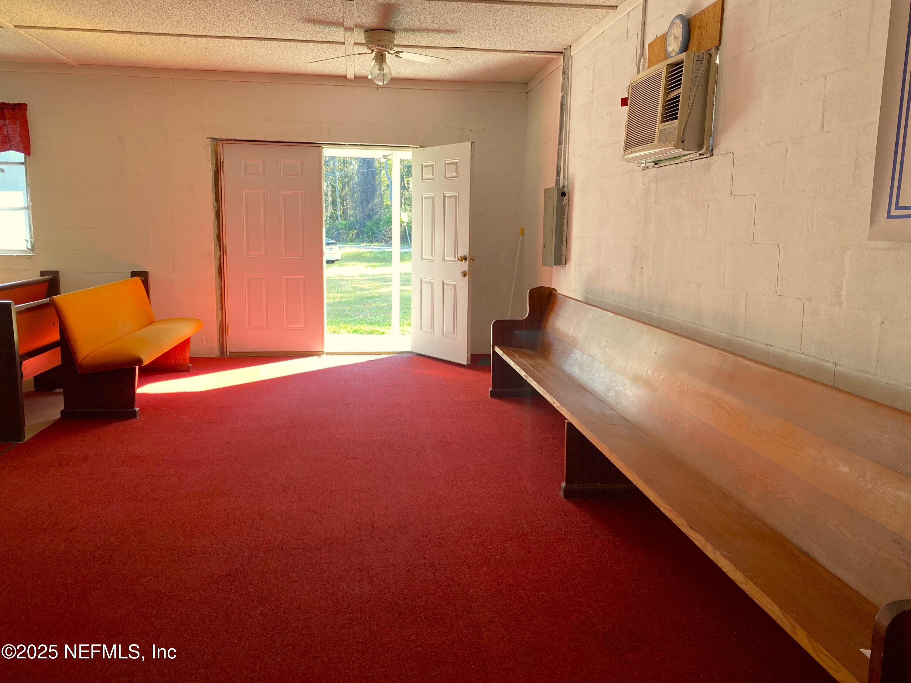 228 Yelvington Road East Palatka, FL 32131 - Photo 9 of 32 a room with furniture and window