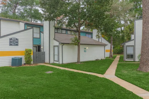 a house view with a garden space