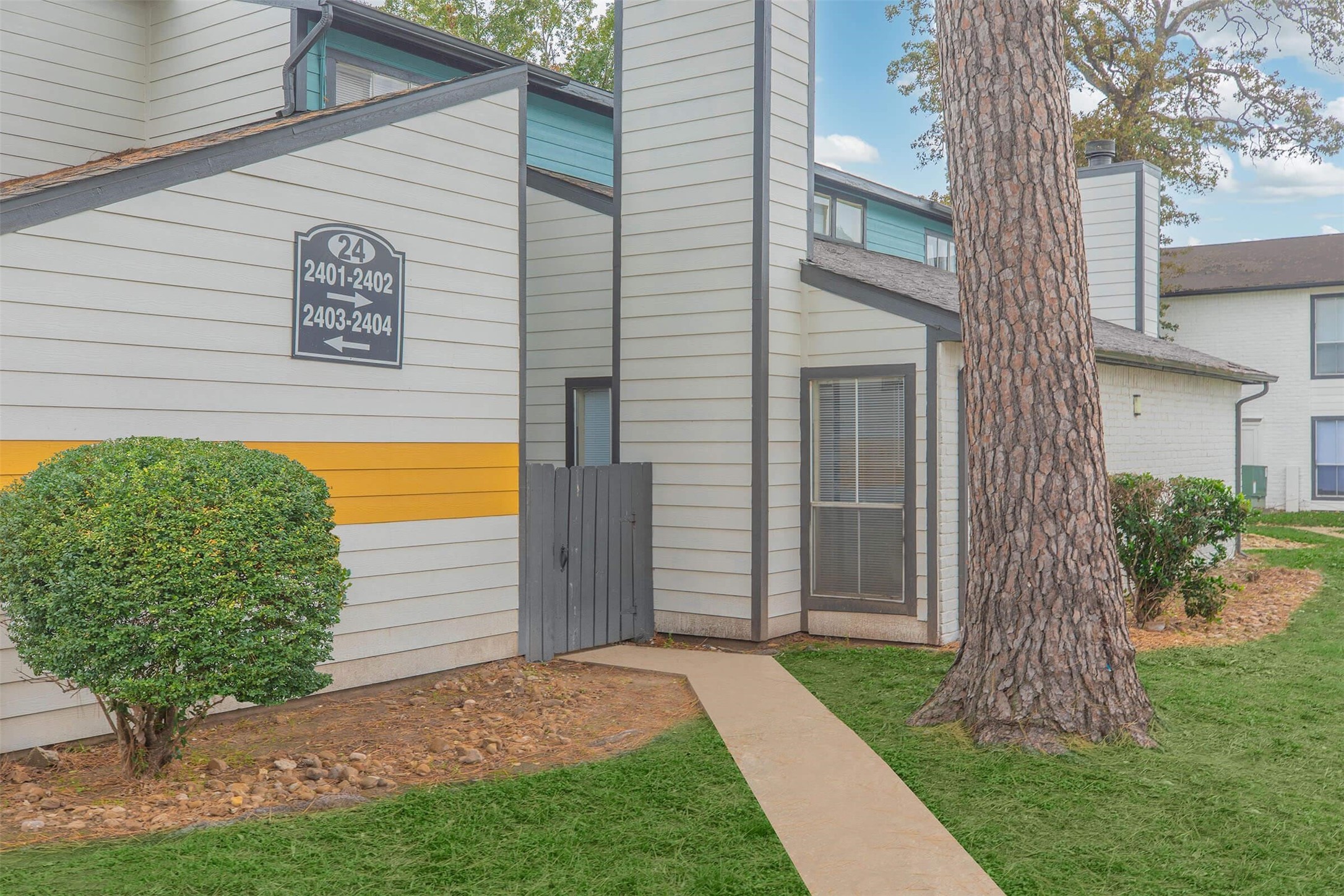21717 Inverness Forest Boulevard, Unit 1702 Houston, TX 77073 - Photo 21 of 33 a view of a back yard of the house