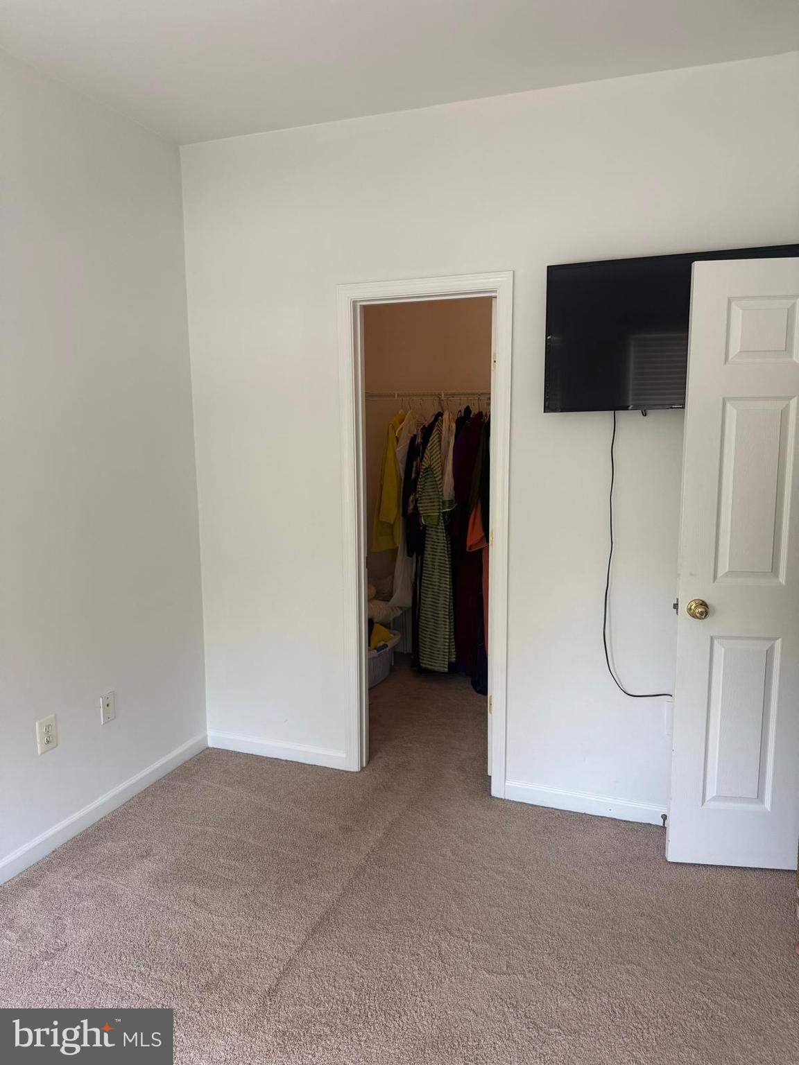 8469 Silverdale Road Lorton, VA 22079 - Photo 7 of 17 a view of a livingroom with wooden floor and cabinet