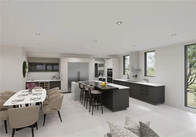 a view of a dining room with furniture and window