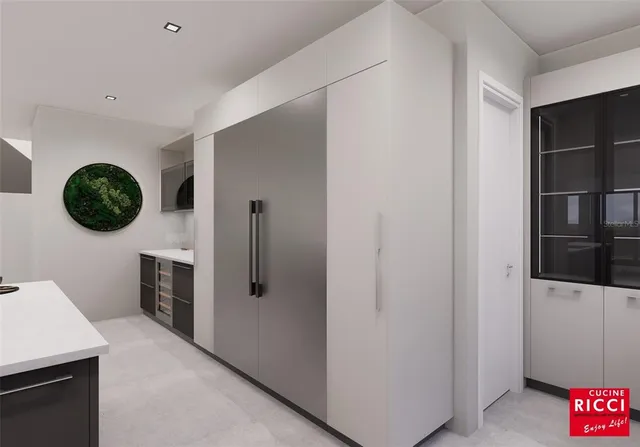 a view of a kitchen with a refrigerator cabinets and a window