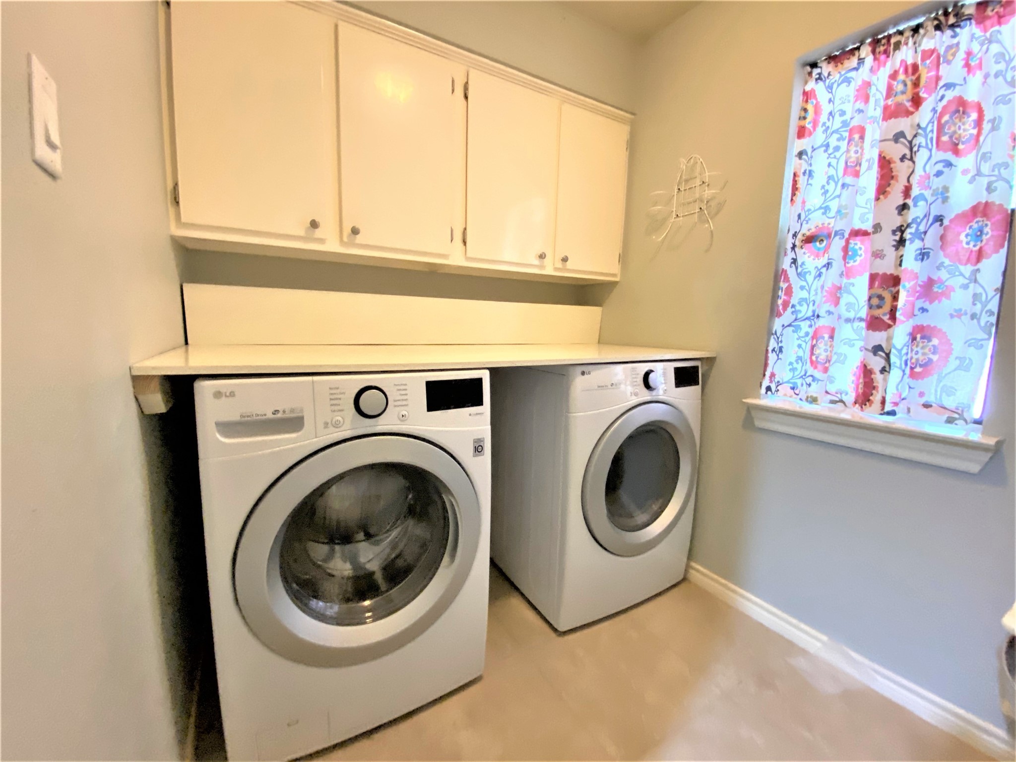 12303 Longfellow Drive Montgomery, TX 77356 - Photo 22 of 25 a utility room with dryer and washer