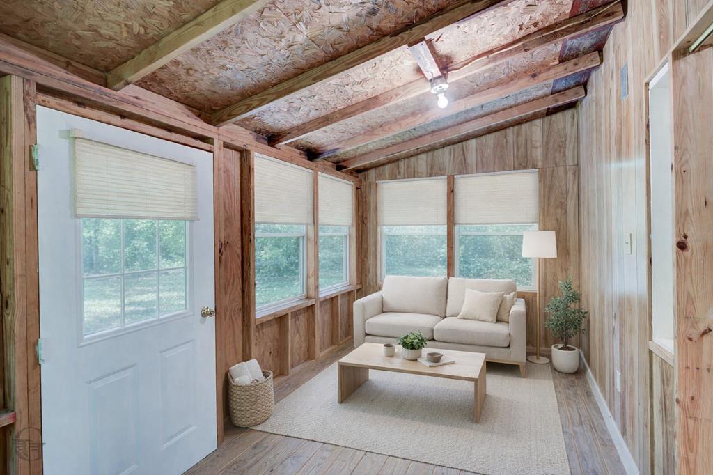 1267 Johnson Road Doyline, LA 71023 - Photo 12 of 19 a living room with furniture and a large window