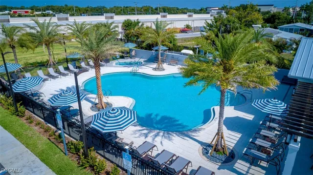 a view of a chairs and table in patio
