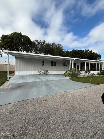 a view of house with outdoor space