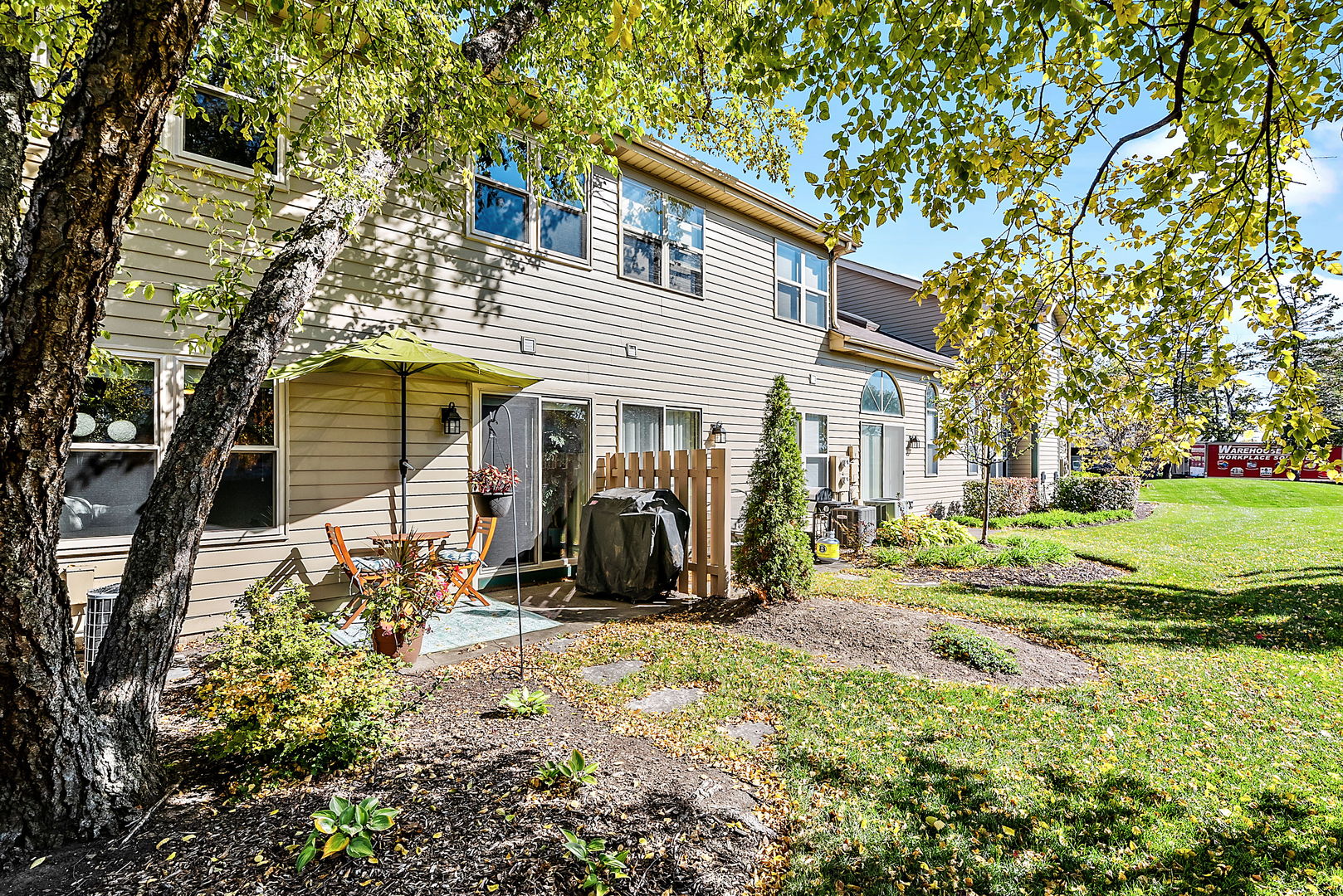 986 Ridgefield Lane Wheeling, IL 60090 - Photo 17 of 17 a view of a house with yard and plants