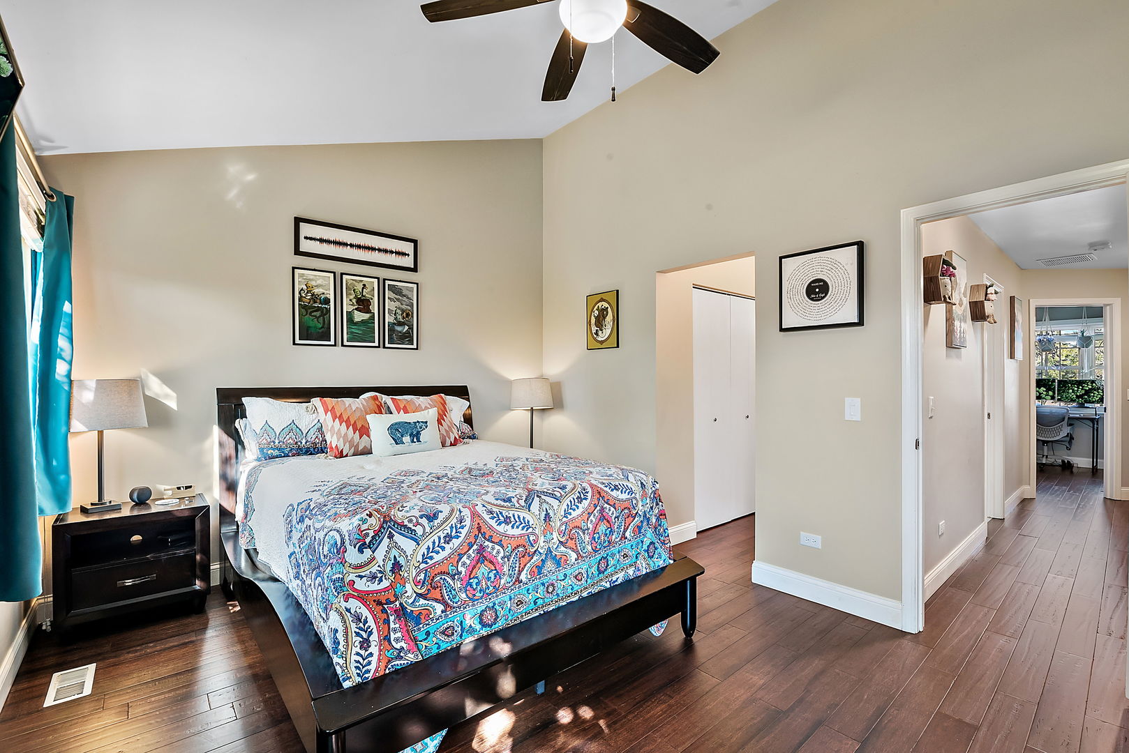 986 Ridgefield Lane Wheeling, IL 60090 - Photo 10 of 17 a bedroom with a bed and wooden floor