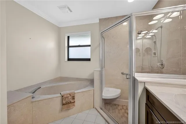 a bedroom that has a bed and a window