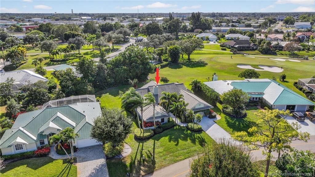 3211 Southeast Court Drive Stuart, FL 34997 - Photo 39 of 60 an aerial view of residential houses with outdoor space