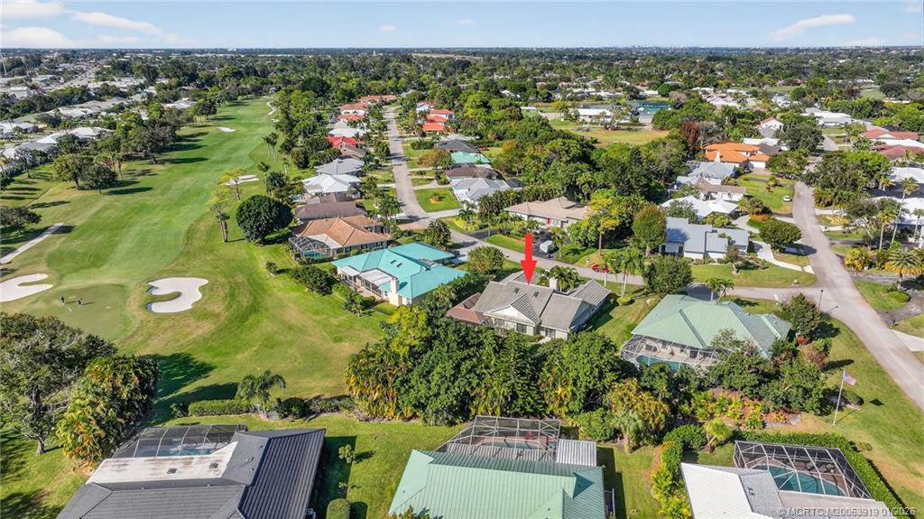 3211 Southeast Court Drive Stuart, FL 34997 - Photo 50 of 60 an aerial view of residential houses with outdoor space