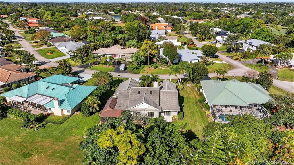 3211 Southeast Court Drive Stuart, FL 34997 - Photo 52 of 60 an aerial view of residential houses with outdoor space