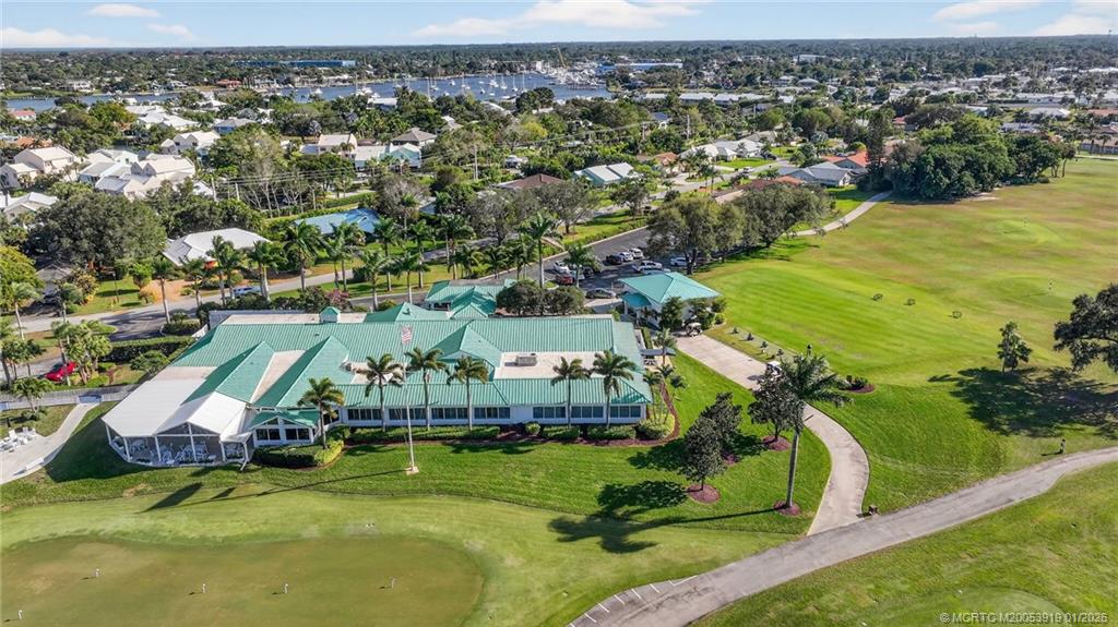 3211 Southeast Court Drive Stuart, FL 34997 - Photo 59 of 60 an aerial view of residential houses with outdoor space and swimming pool