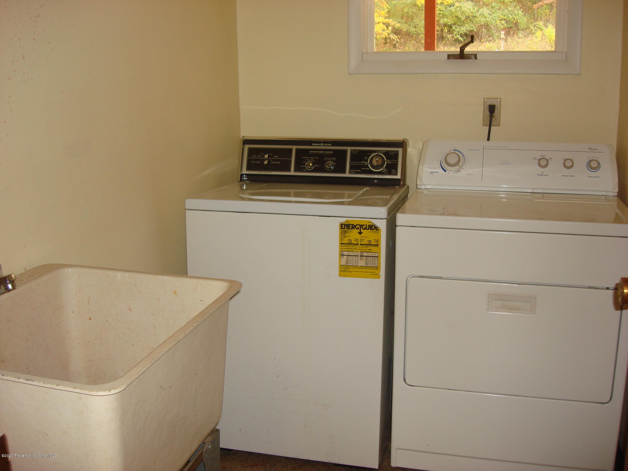 72 Hall Road Laceyville, PA 18623 - Photo 21 of 67 a utility room with dryer and washer