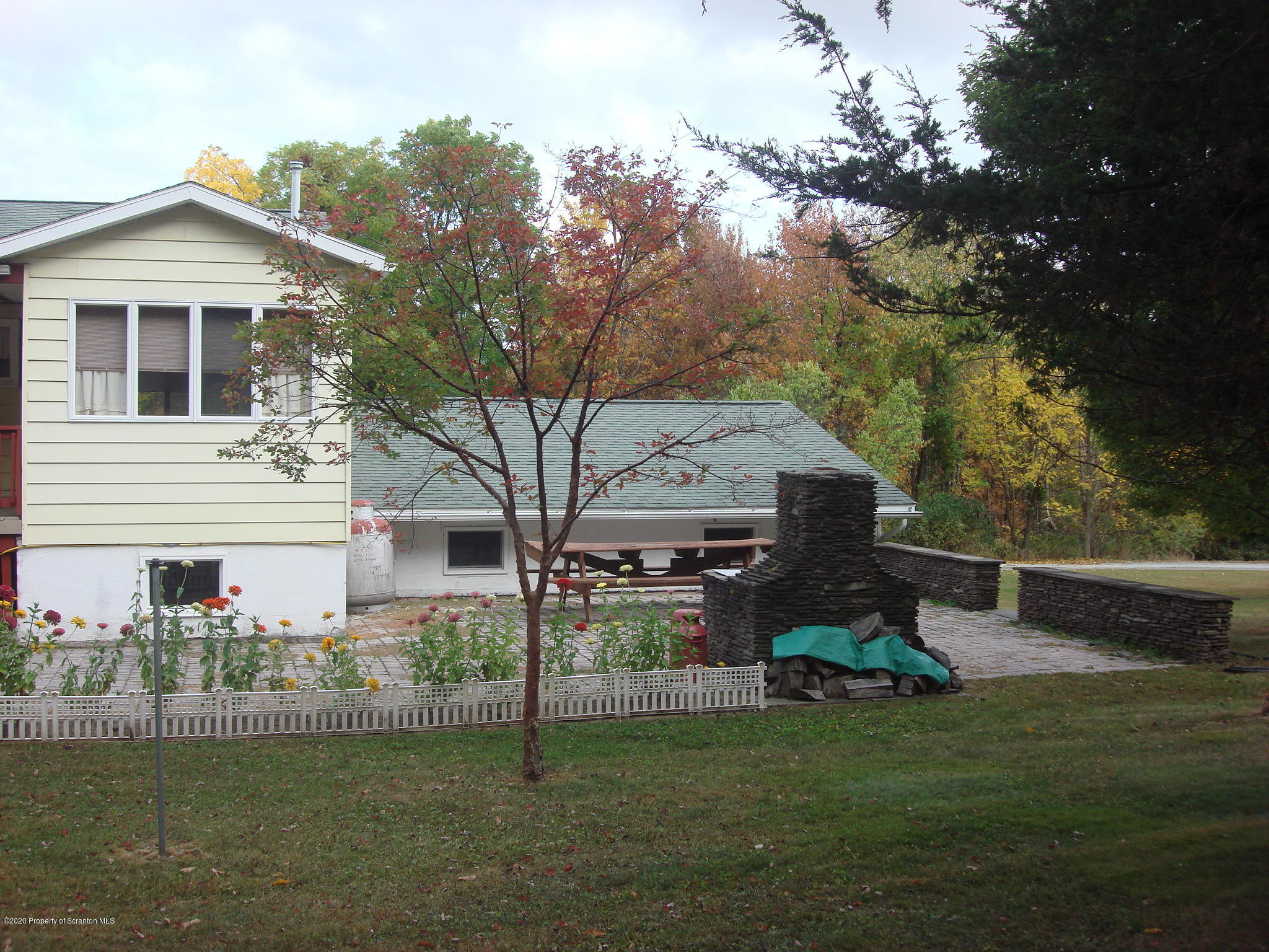 72 Hall Road Laceyville, PA 18623 - Photo 27 of 67 a view of a house with a backyard