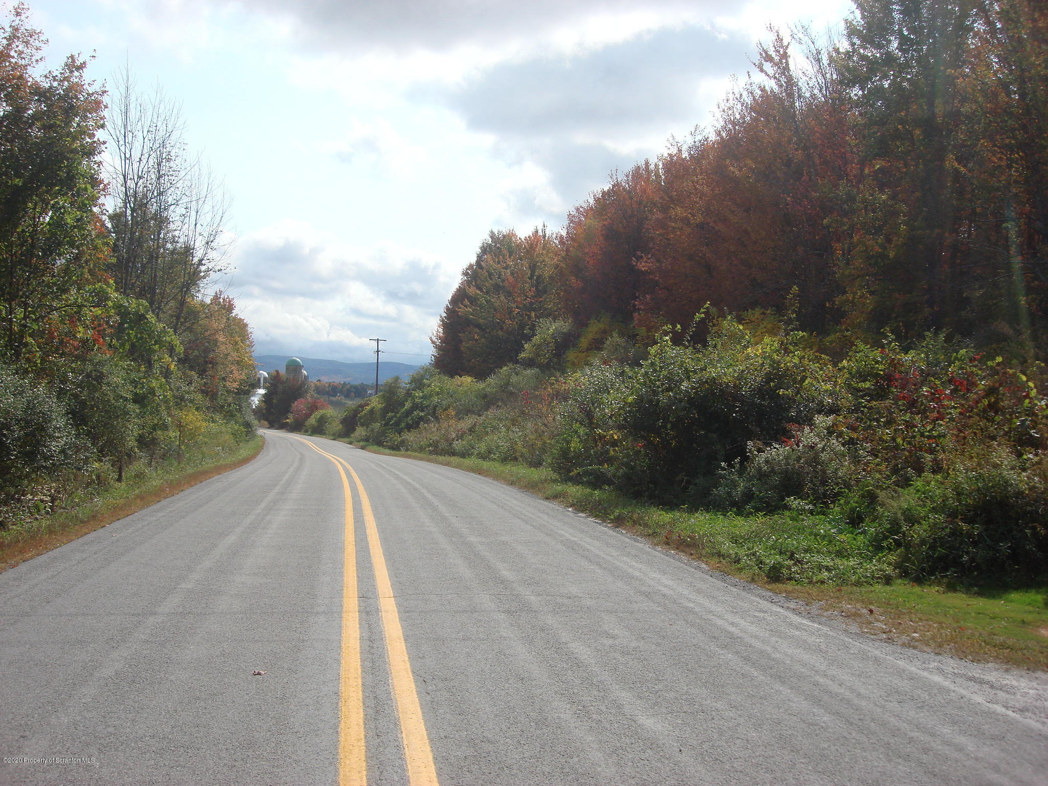 72 Hall Road Laceyville, PA 18623 - Photo 42 of 67 a view of a road with a yard