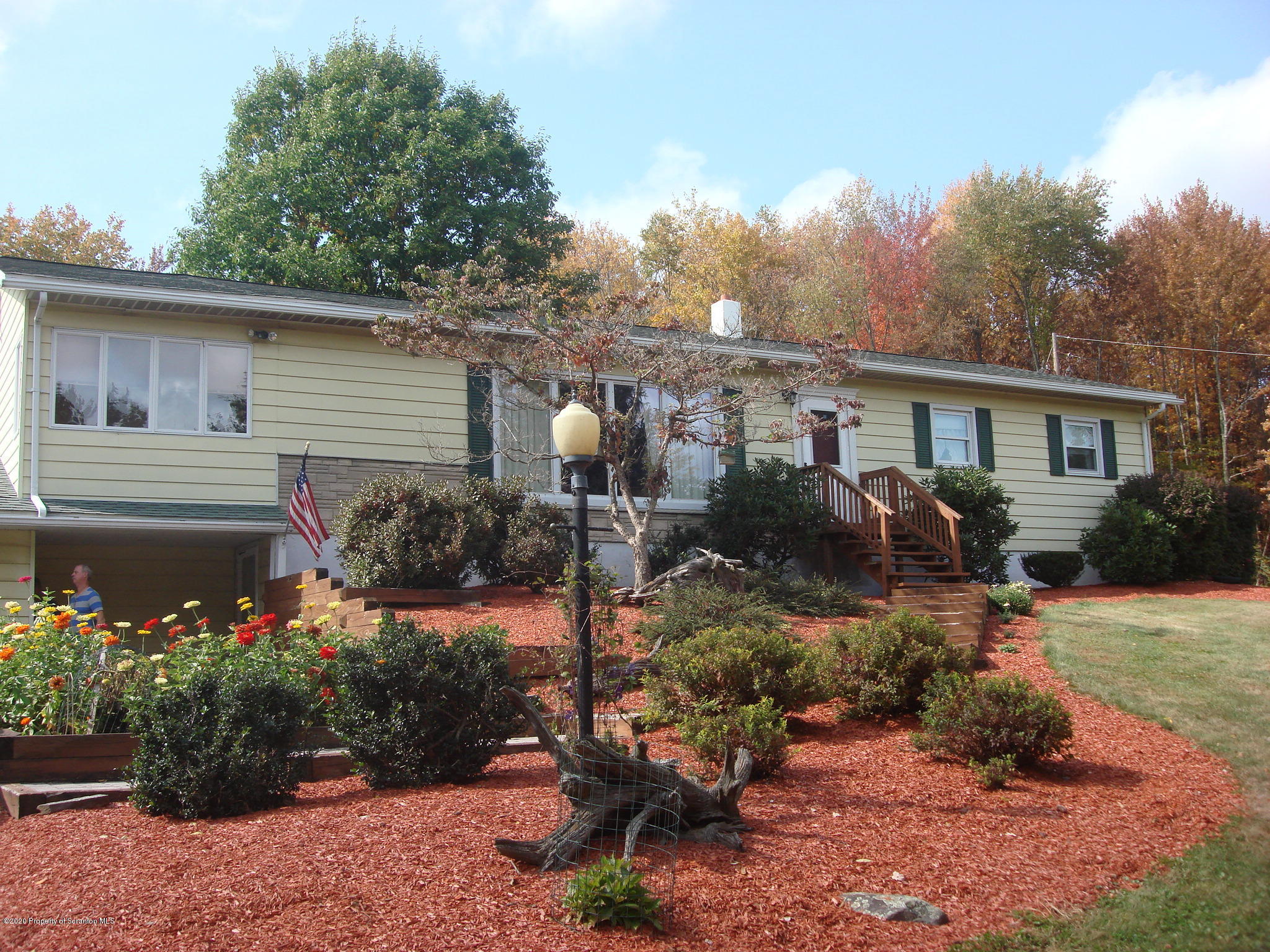 72 Hall Road Laceyville, PA 18623 - Photo 45 of 67 a front view of a house with a yard