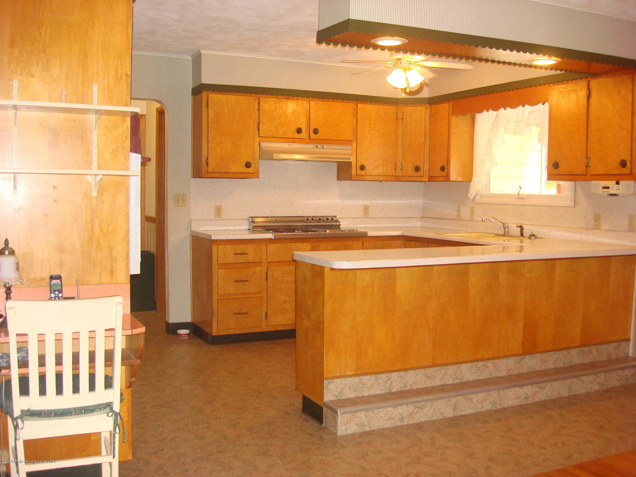 72 Hall Road Laceyville, PA 18623 - Photo 9 of 67 a view of a kitchen with a large window