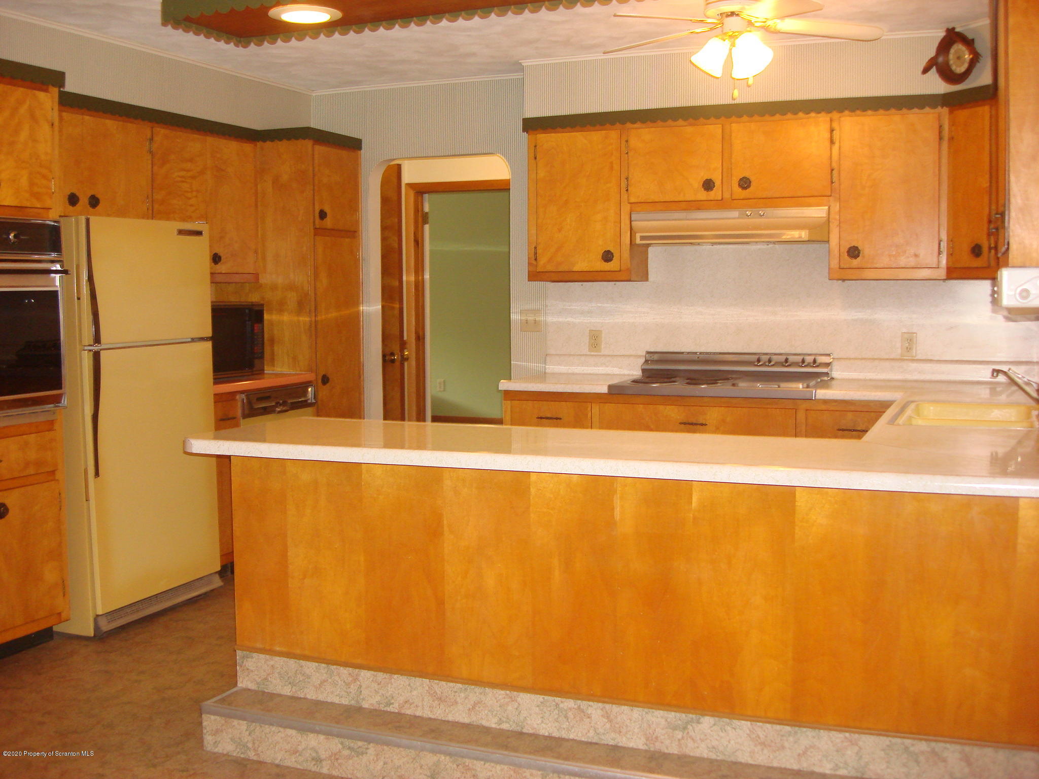 72 Hall Road Laceyville, PA 18623 - Photo 10 of 67 a view of kitchen with wooden floor and cabinets