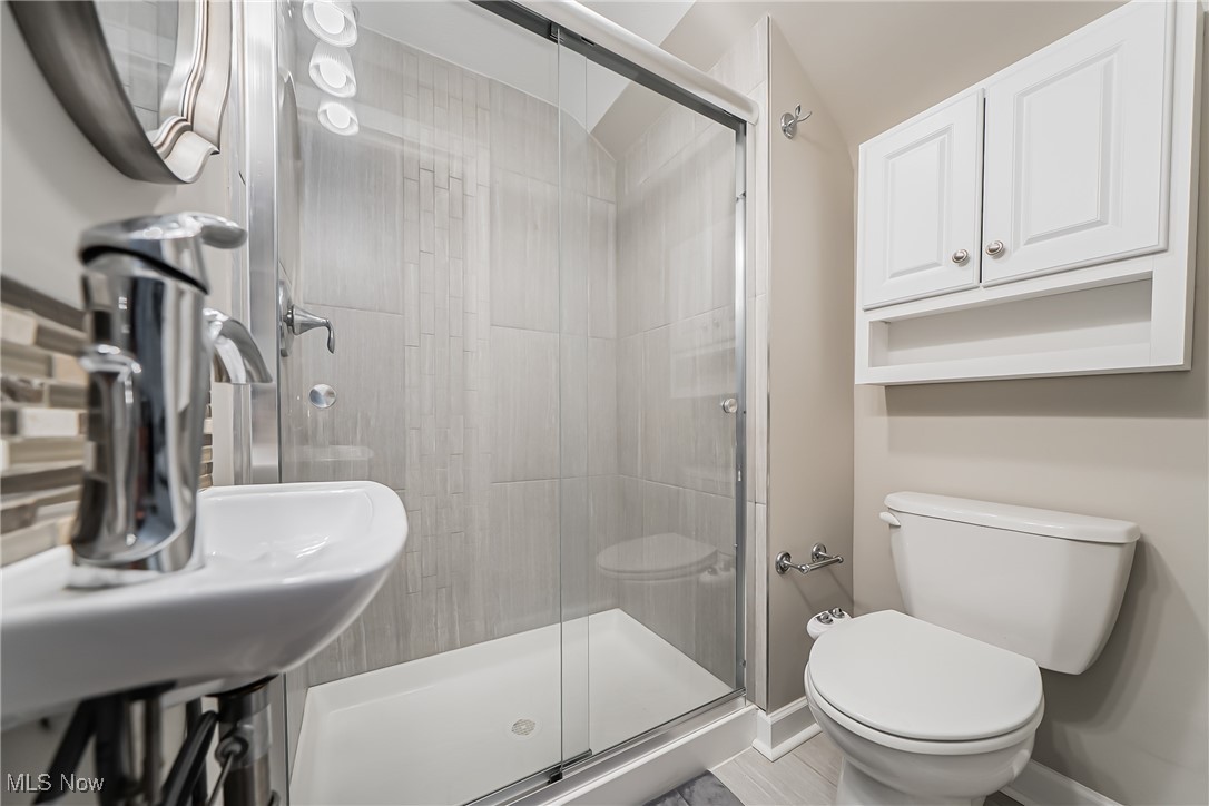 3684 Fenley Road Cleveland Heights, OH 44121 - Photo 17 of 38 Full bathroom featuring toilet and a stall shower