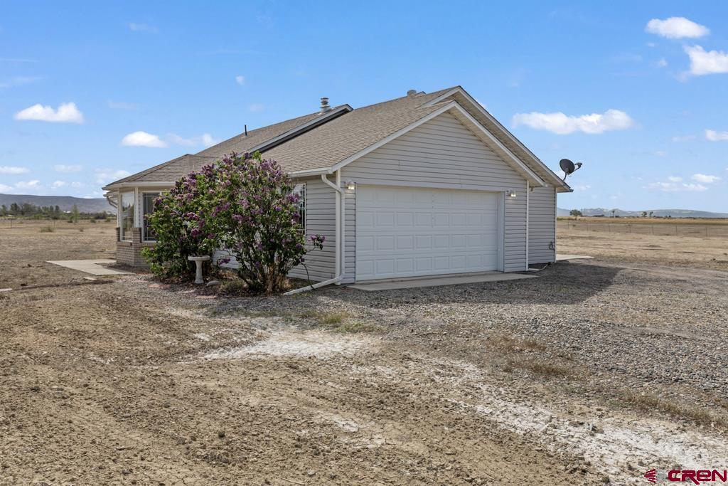 19496 E Road Delta, CO 81416 - Photo 29 of 33 a view of backyard of house
