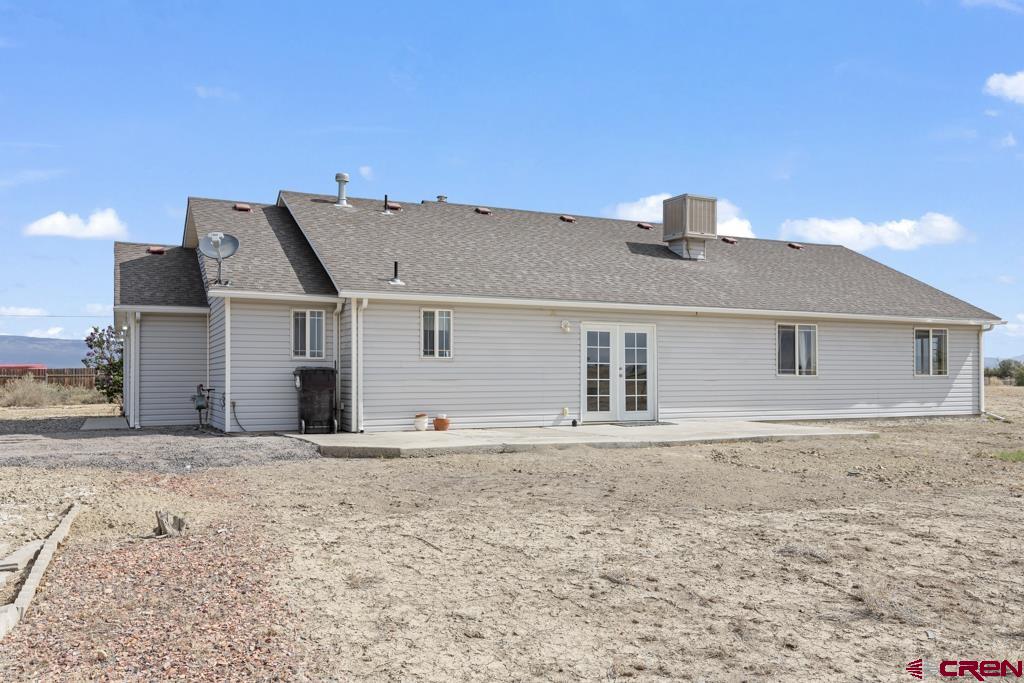 19496 E Road Delta, CO 81416 - Photo 30 of 33 a front view of a house with a yard
