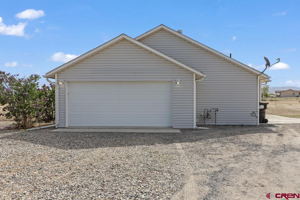19496 E Road Delta, CO 81416 - Photo 3 of 33 a front view of house