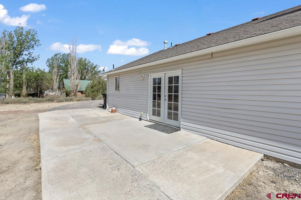 19496 E Road Delta, CO 81416 - Photo 32 of 33 a view of a house with a patio