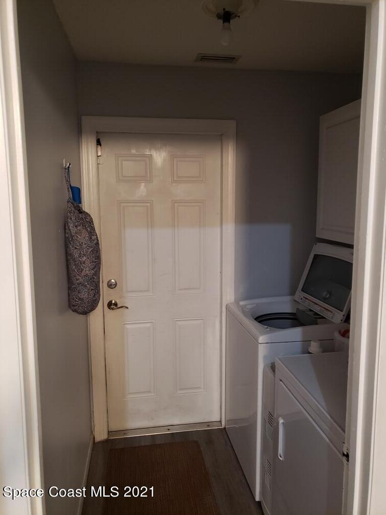232 Rheine Road Northwest Palm Bay, FL 32907 - Photo 9 of 11 a view of storage and utility room