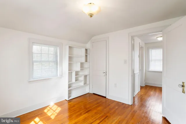 a view of livingroom with hardwood floor and window
