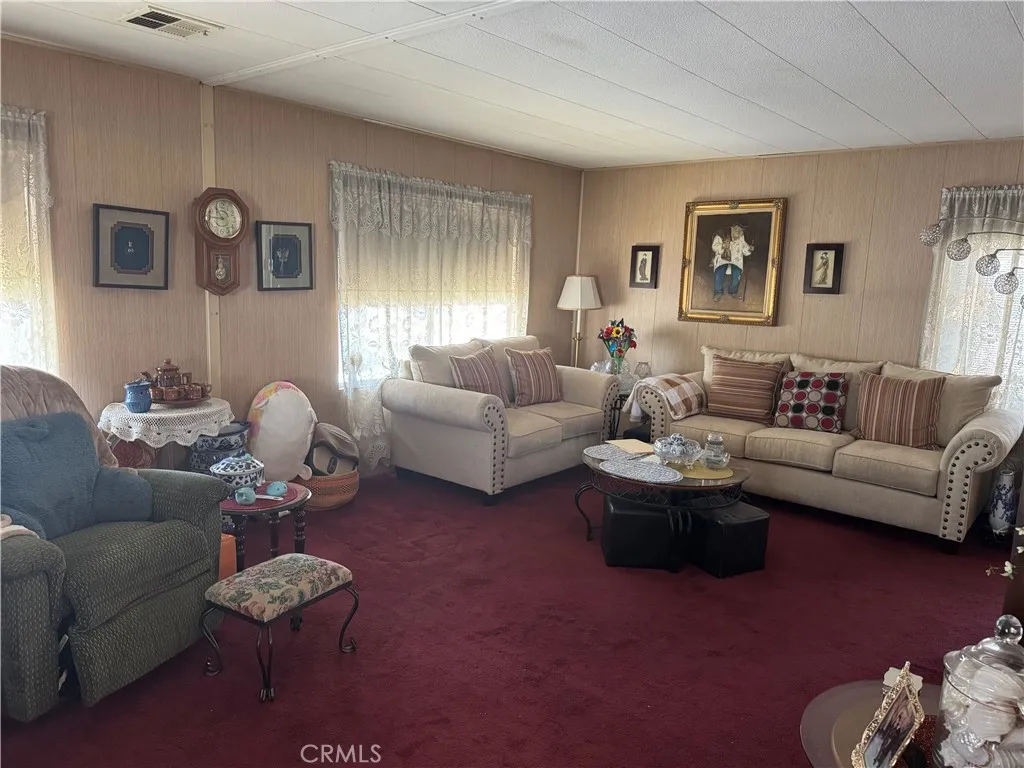 7271 Katella, Unit 84 Stanton, CA 90680 - Photo 5 of 5 a living room with furniture and a window