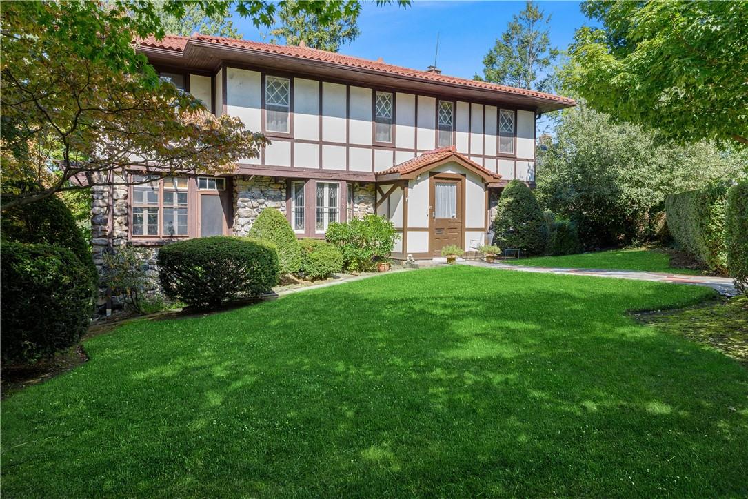 27 Chatfield Road Bronxville, NY 10708 - Photo 1 of 1 a front view of a house with a garden