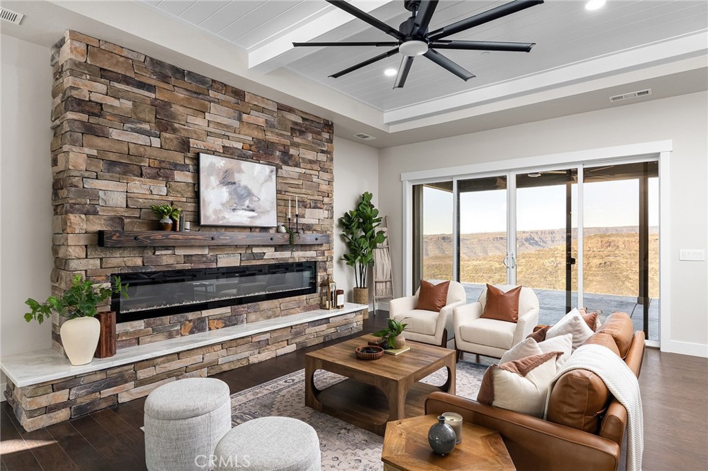 163 Valley Ridge Drive Paradise, CA 95969 - Photo 11 of 69 a living room with furniture and a floor to ceiling window