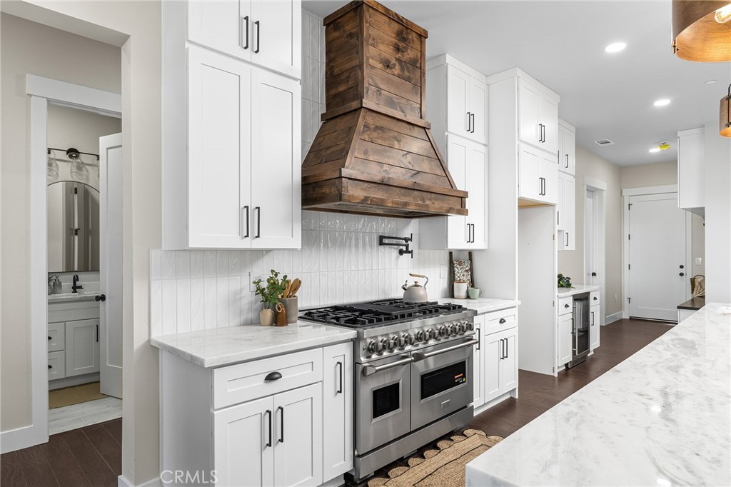 163 Valley Ridge Drive Paradise, CA 95969 - Photo 21 of 69 a kitchen with stainless steel appliances granite countertop a stove and a refrigerator